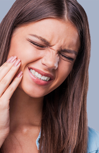 Young Woman Suffering from Toothache in Woodbridge, VA